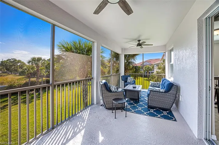 Sunroom featuring ceiling fan