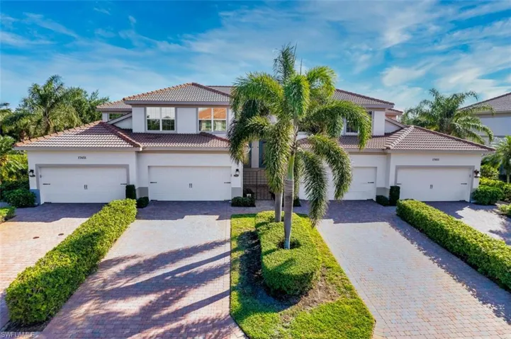 Mediterranean / spanish-style house featuring a garage