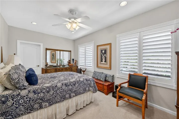 2nd level, 2nd Bedroom with light colored carpet, recessed lighting, and a ceiling fan
