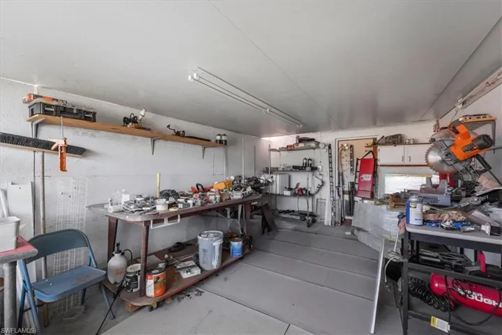 Below grade area featuring a workshop area