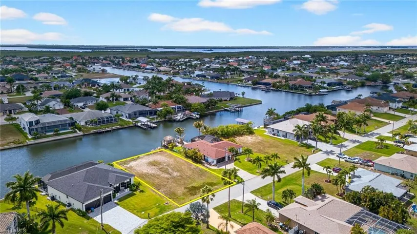 Aerial view of residential area with a large body of water