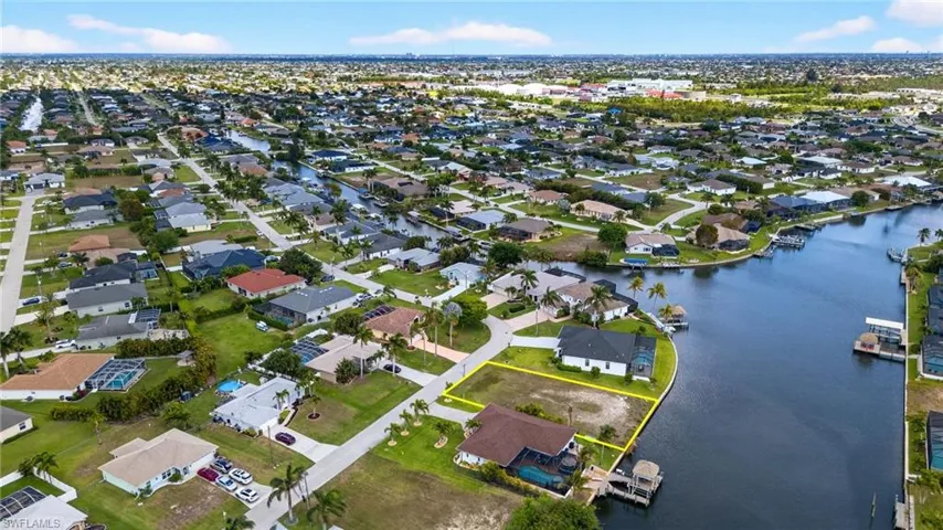 Aerial view of residential area with a large body of water