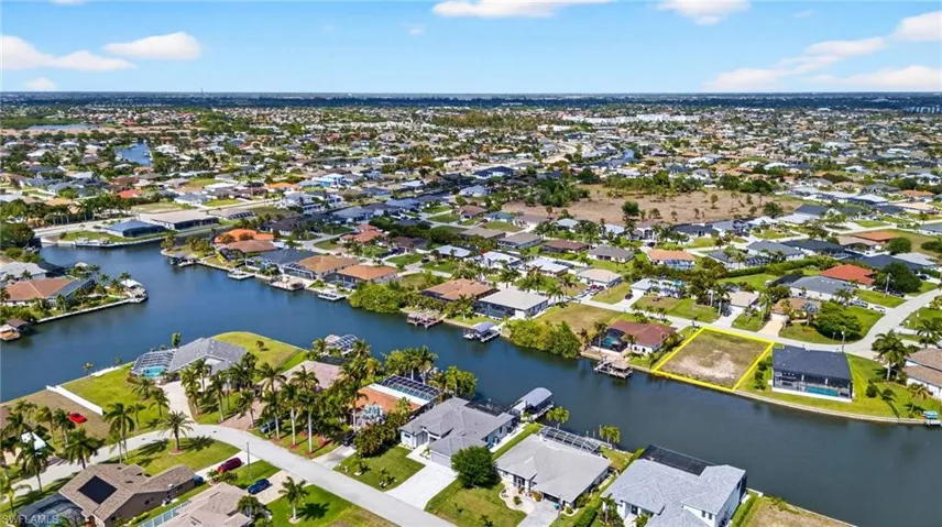 Aerial view of residential area with a large body of water