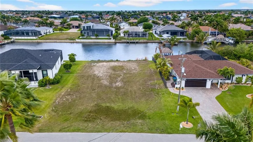 Aerial view of residential area with a large body of water