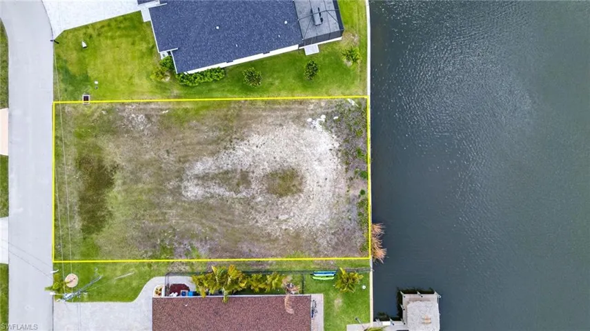 View of property location featuring property parcel outlined and a large body of water