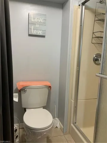 Owner commode area & step-in shower