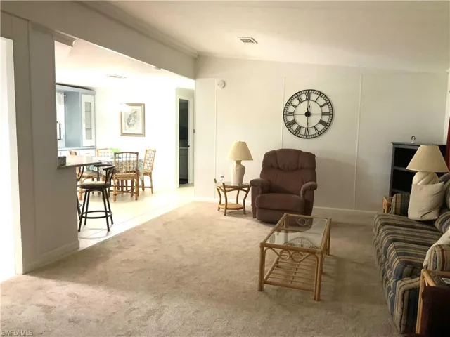 Walk thru family room leads to kitchen & dining