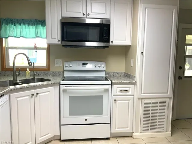 Range, microwave & storage cabinet