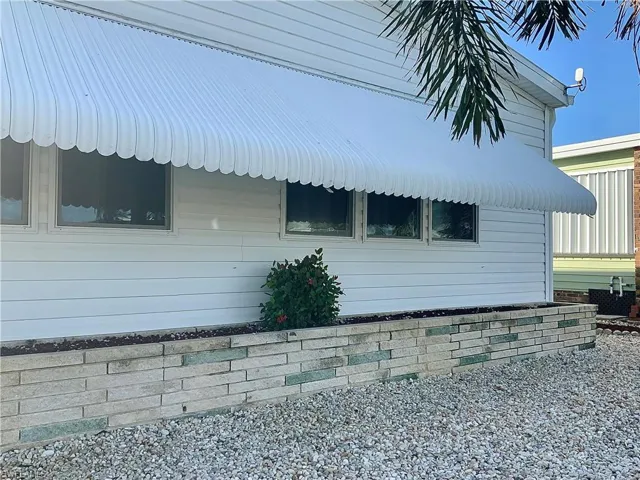 Close up of front raised flower bed & shutters
