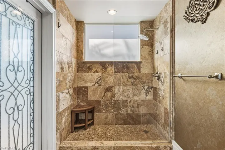Bathroom with tiled shower