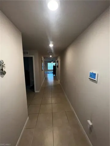 Front door entrance view. Bedrooms 3 & 4,  bathroom to the left.