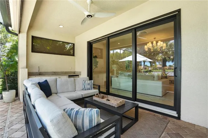 View of patio / terrace with an outdoor hangout area and ceiling fan