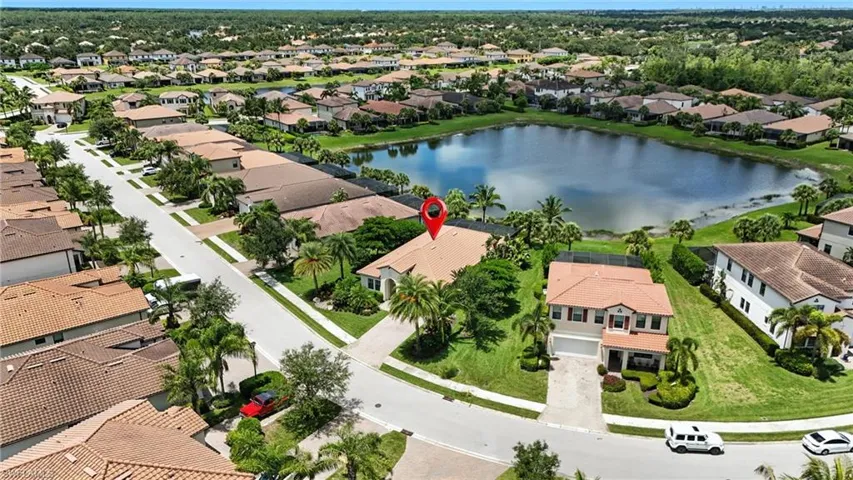 Aerial view of residential area with a large body of water