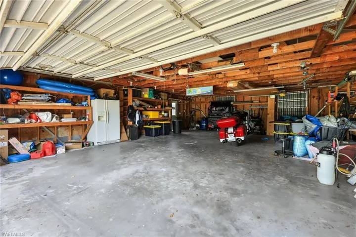 832 Sq Ft Garage with built-in shelving