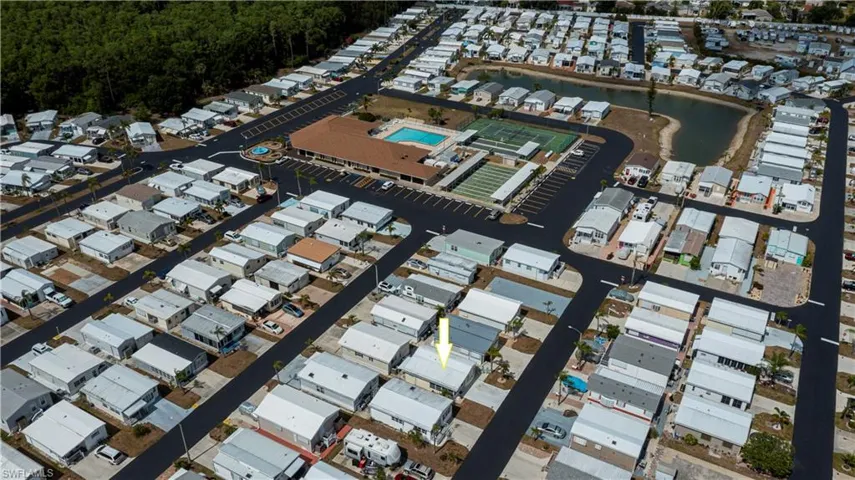 Aerial view with a water view and a residential view