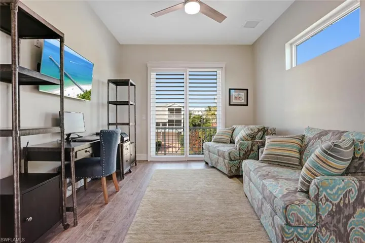 Main-level den/office or extra bedroom with closet for guests