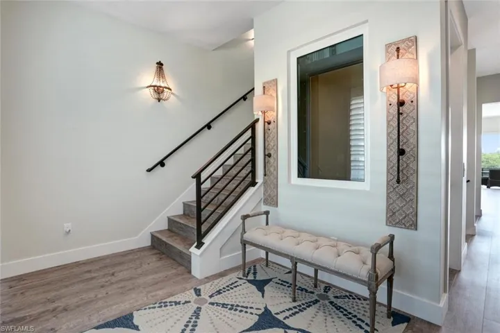 Entry foyer with access to main living and third floors via elevator or stairs
