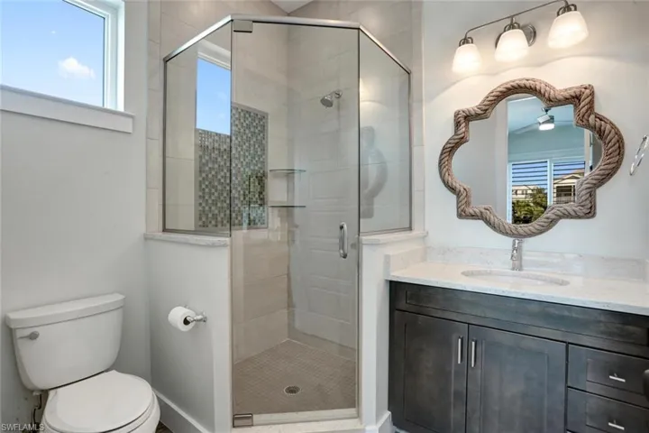 Main-level bathroom off den/office extra bedroom