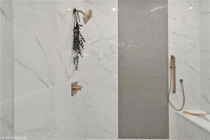 Interior details featuring tiled shower