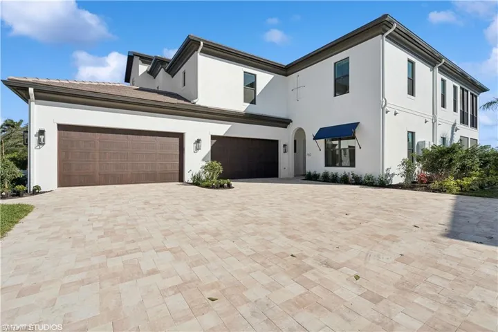 View of front of property with a garage