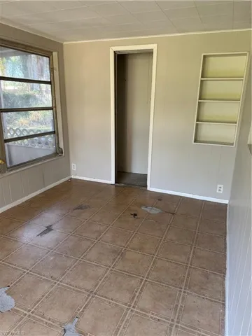 The flooring in this room has been replaced. See next photo.