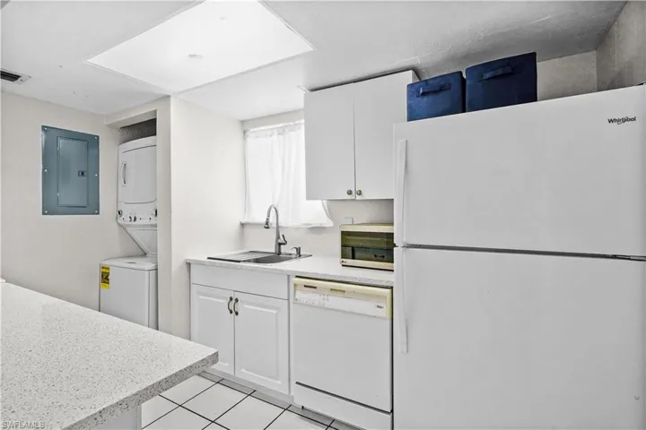 Kitchen - Window, new sink, dishwasher, microwave, refrigerator/freezer, washer/dryer