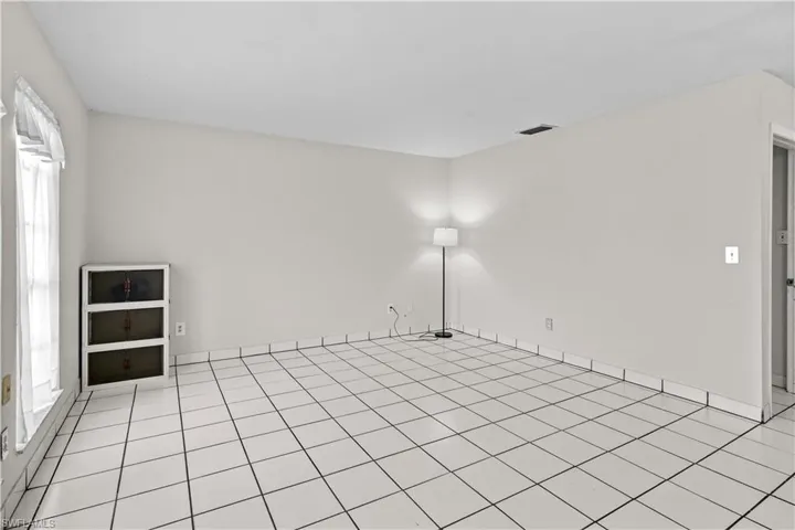 Living Room - Large window for lots of natural light.