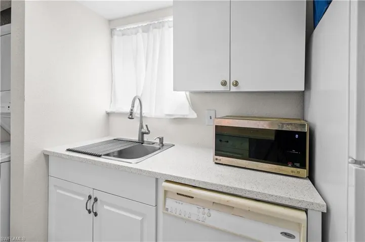 Kitchen - Window, new sink, dishwasher & microwave