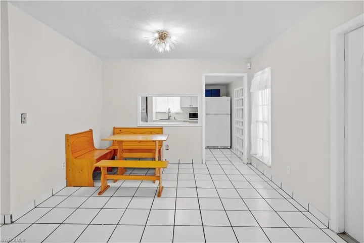 Living Room - Front door, dining area, pass-thru to the kitchen