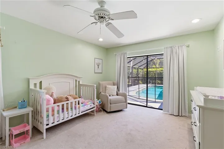 Bedroom featuring a sunroom, recessed lighting, light carpet, a ceiling fan, and access to outside