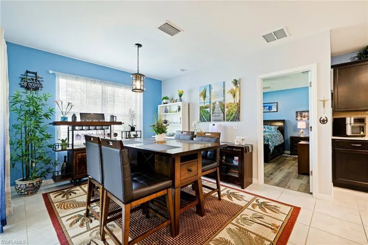 Dining room featuring light tile patterned floors