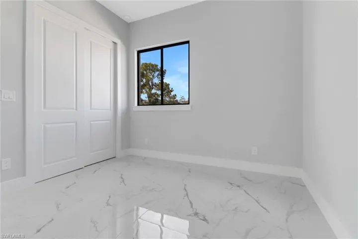 Unfurnished bedroom featuring a closet