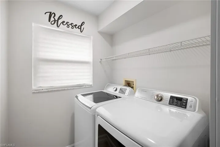 Washroom with separate washer and dryer