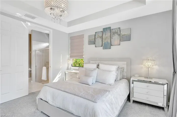 Primary bedroom with queen sized bed