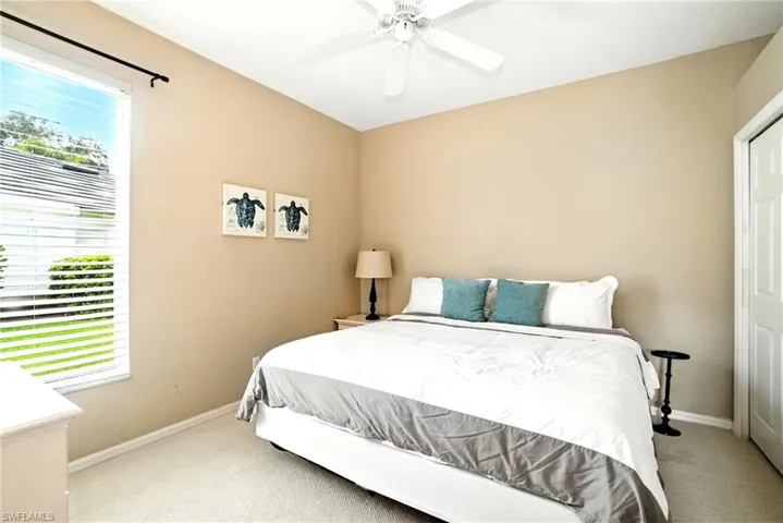 Bedroom featuring carpet floors and ceiling fan