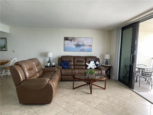 Living area - is beach side with large living space in this end unit