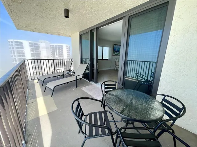 21 ft End Unit Balcony with Awesome views TOP floor views of the entire 4.5 mile crescent beach Notice impact sliders