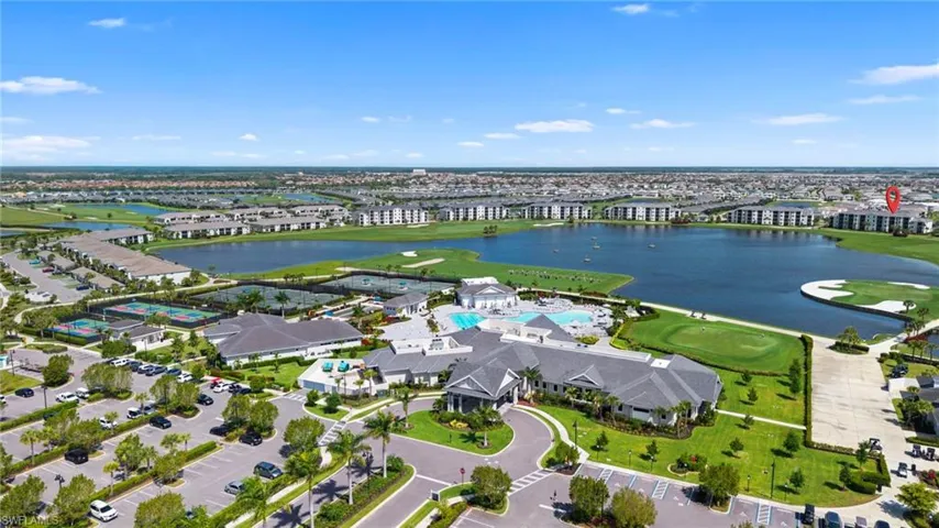 Aerial view of a nearby body of water and a golf course