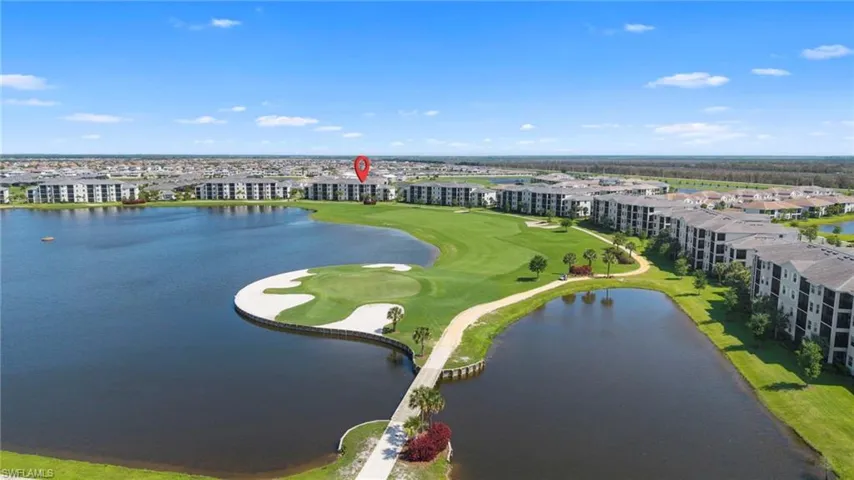 Aerial view of a large body of water and a golf course