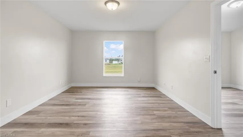 Spare room featuring light hardwood / wood-style floors