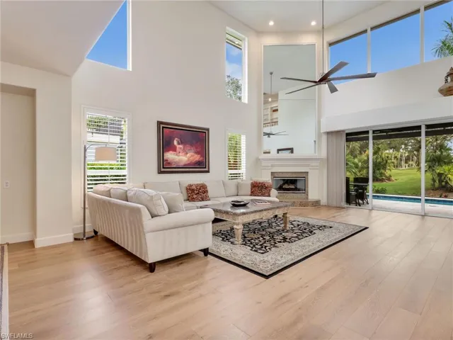 Spacious living room with a golf course view