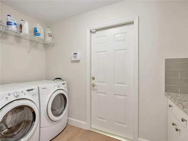 The laundry is accessible from the kitchen with entry to the garage