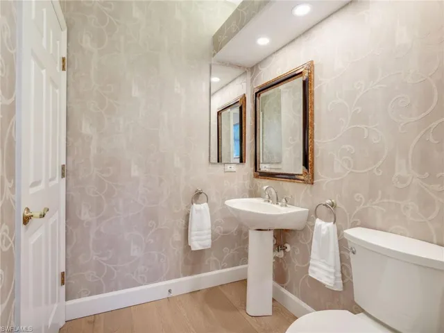 The powder bath accessible from the office and main living area