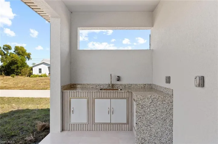 View of patio / terrace with a sink