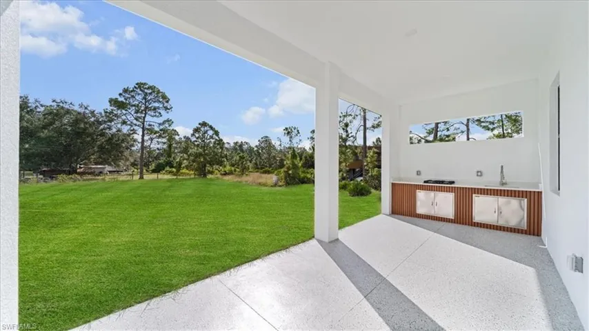View of patio / terrace featuring area for grilling and a sink
