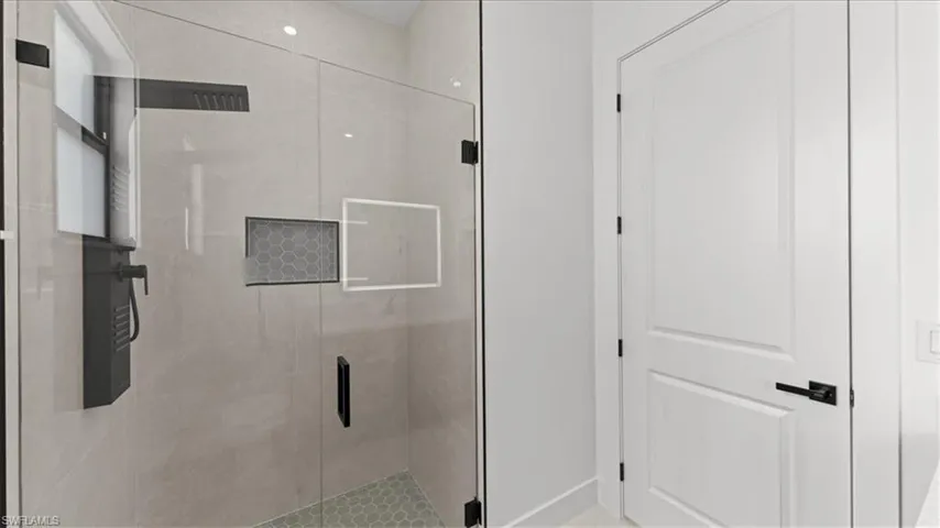 Bathroom featuring a stall shower