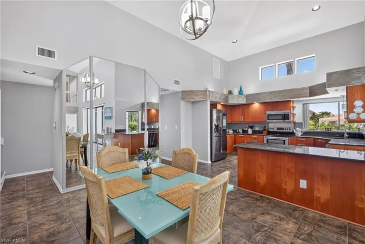 Dining area with access to large living area and kitchen