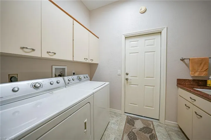 Landry room with utility sink