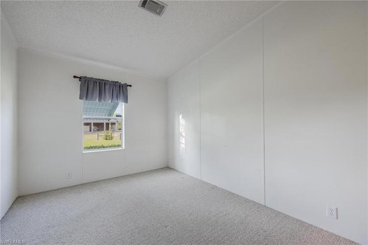 3rd bedroom with walk in closet.