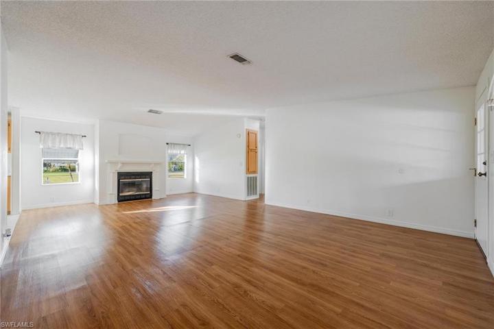 Main living room with fireplace.